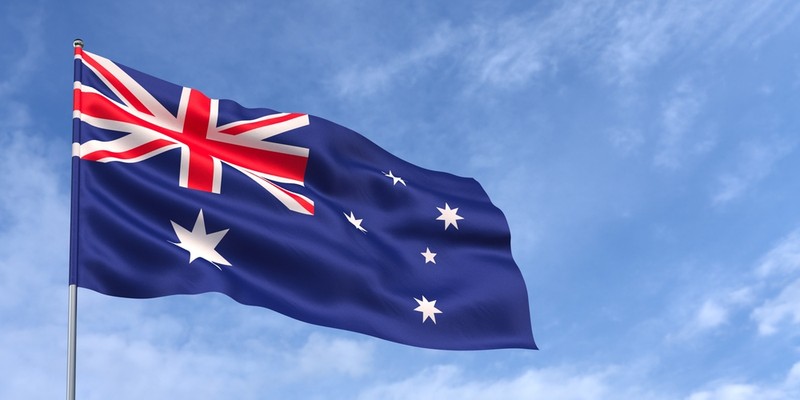 Australian Flag Against Blue Cloudy Sky