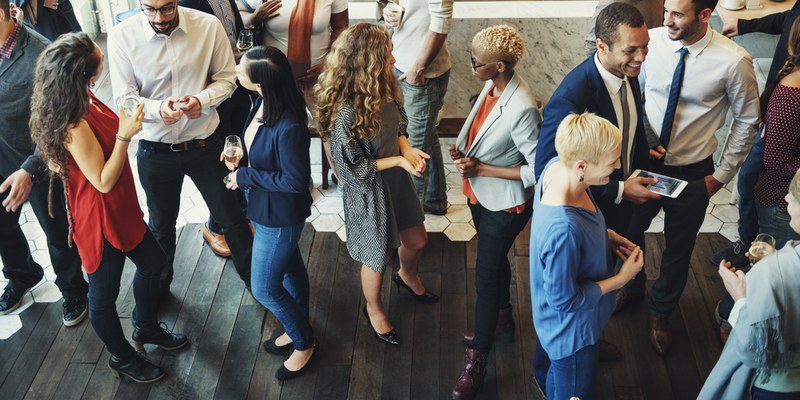 Group of People Talking at Business Event